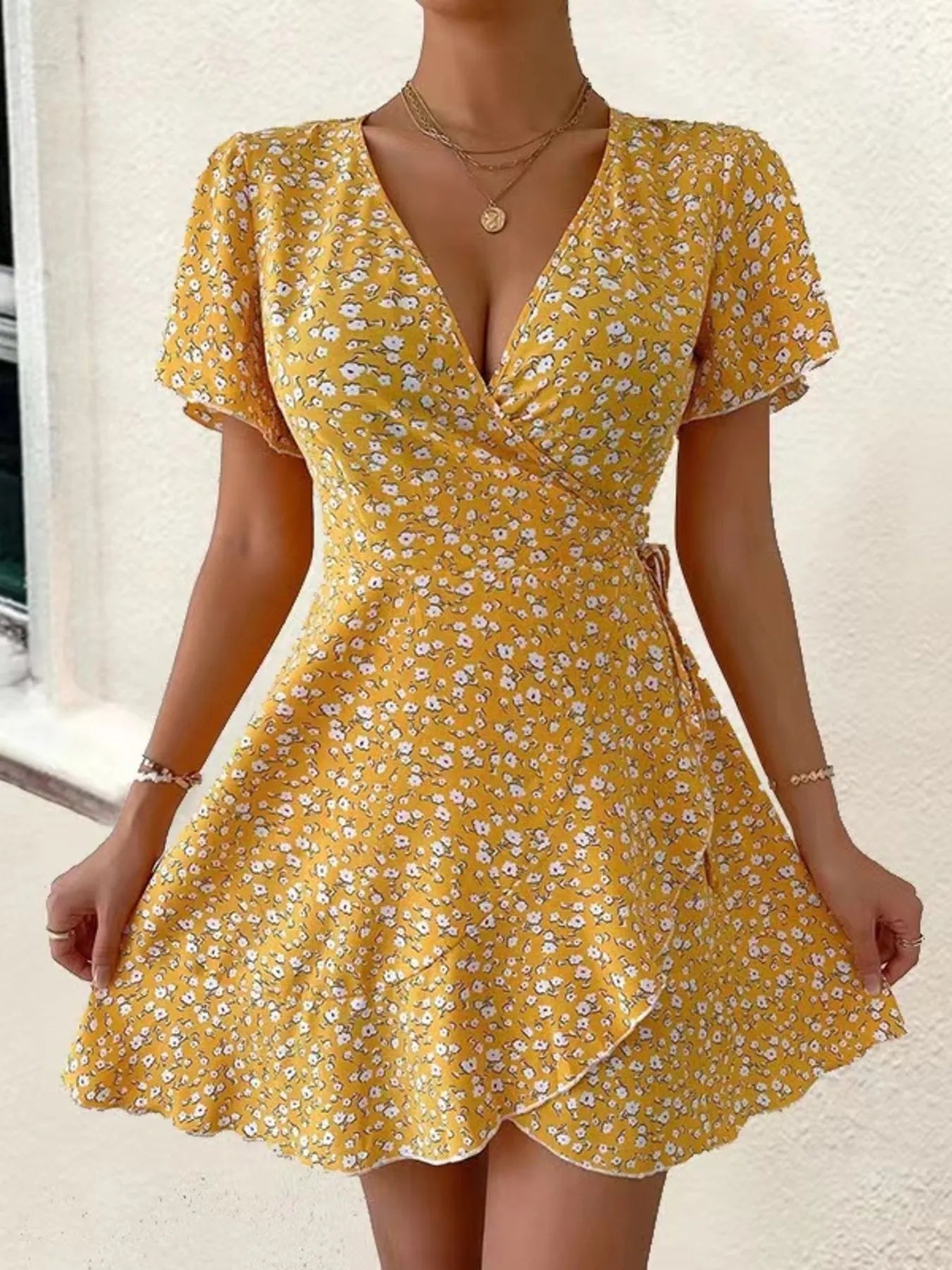 Floral Flutter Sleeve Wrap Mini Dress.