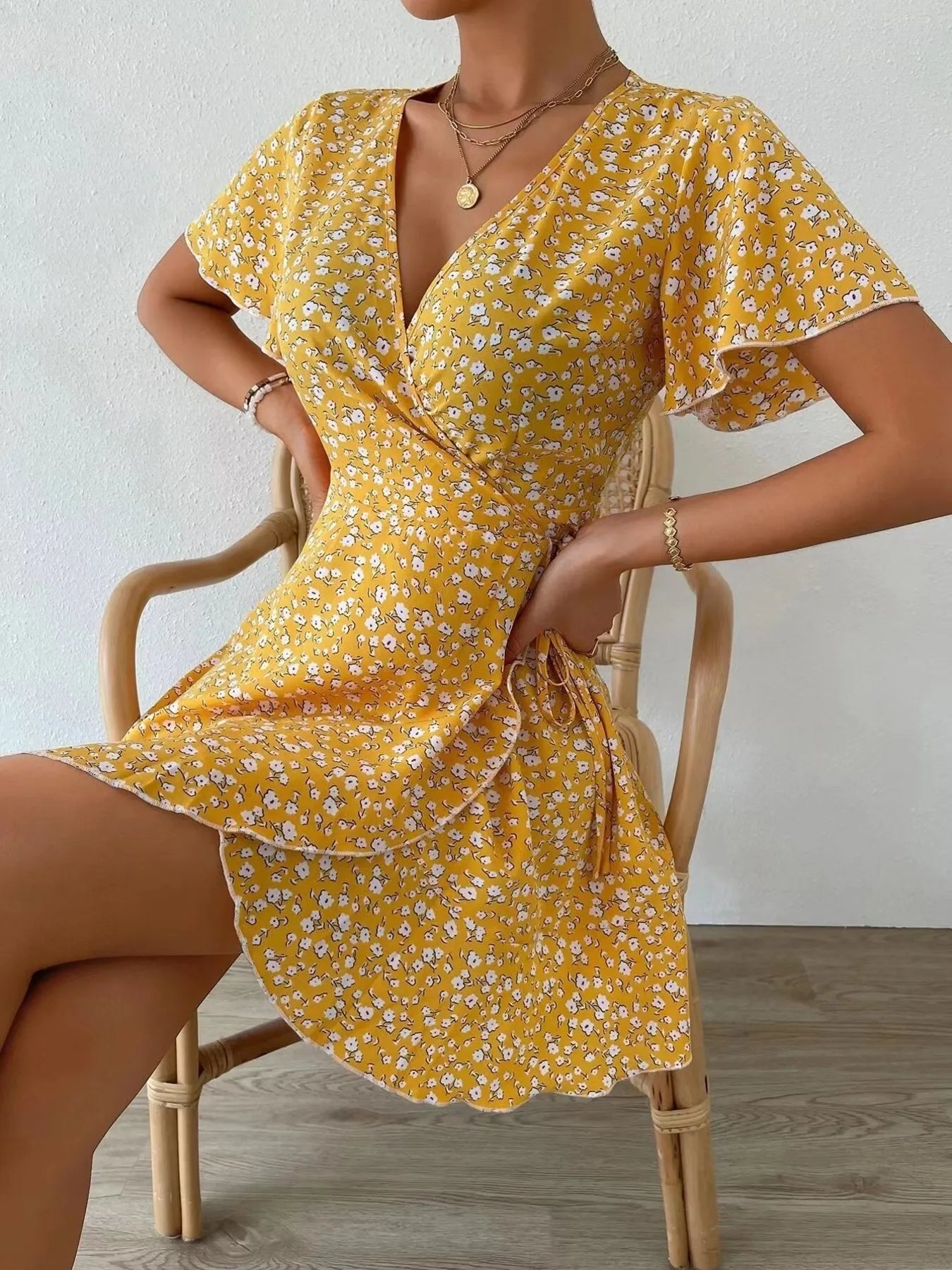 Floral Flutter Sleeve Wrap Mini Dress.