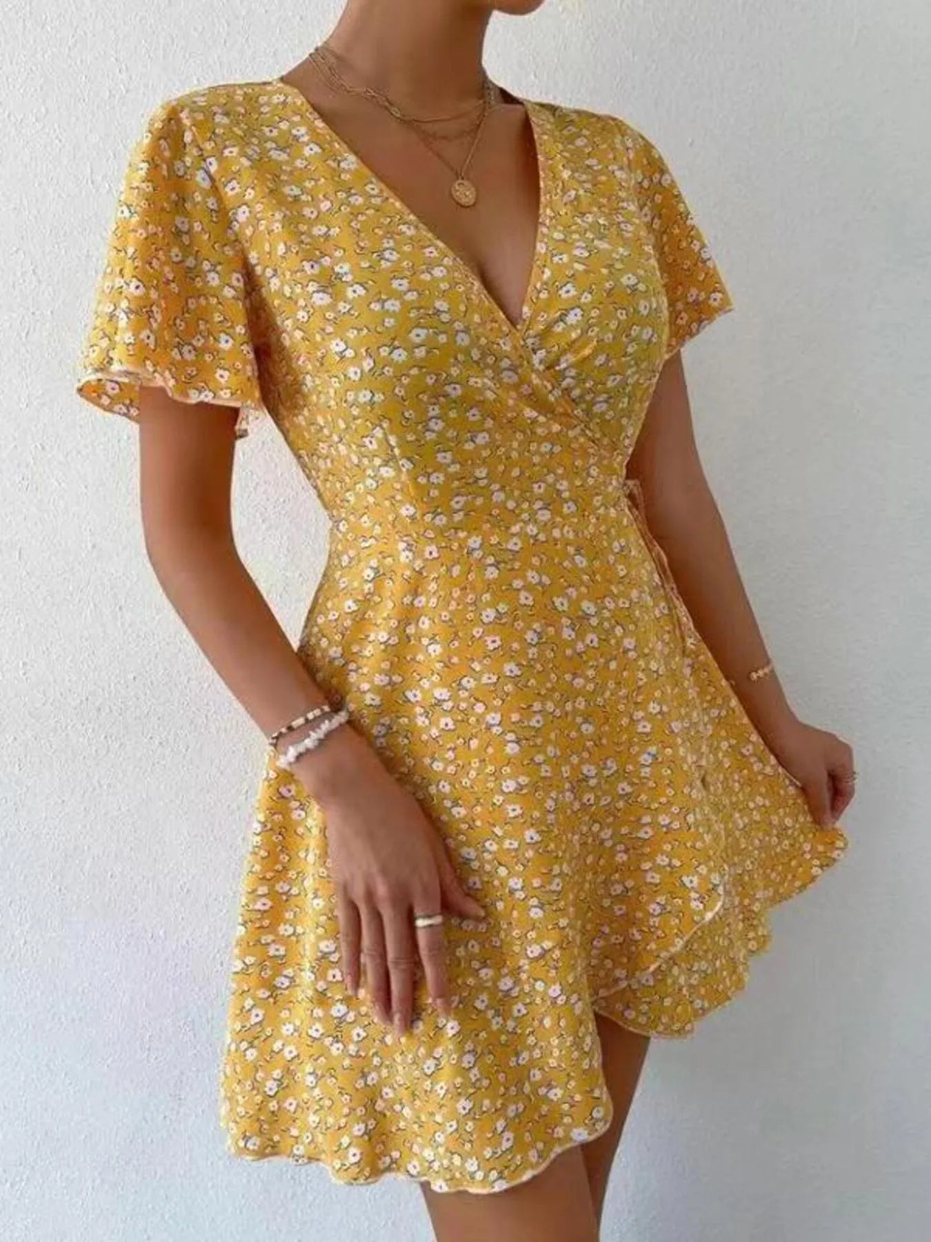 Floral Flutter Sleeve Wrap Mini Dress.