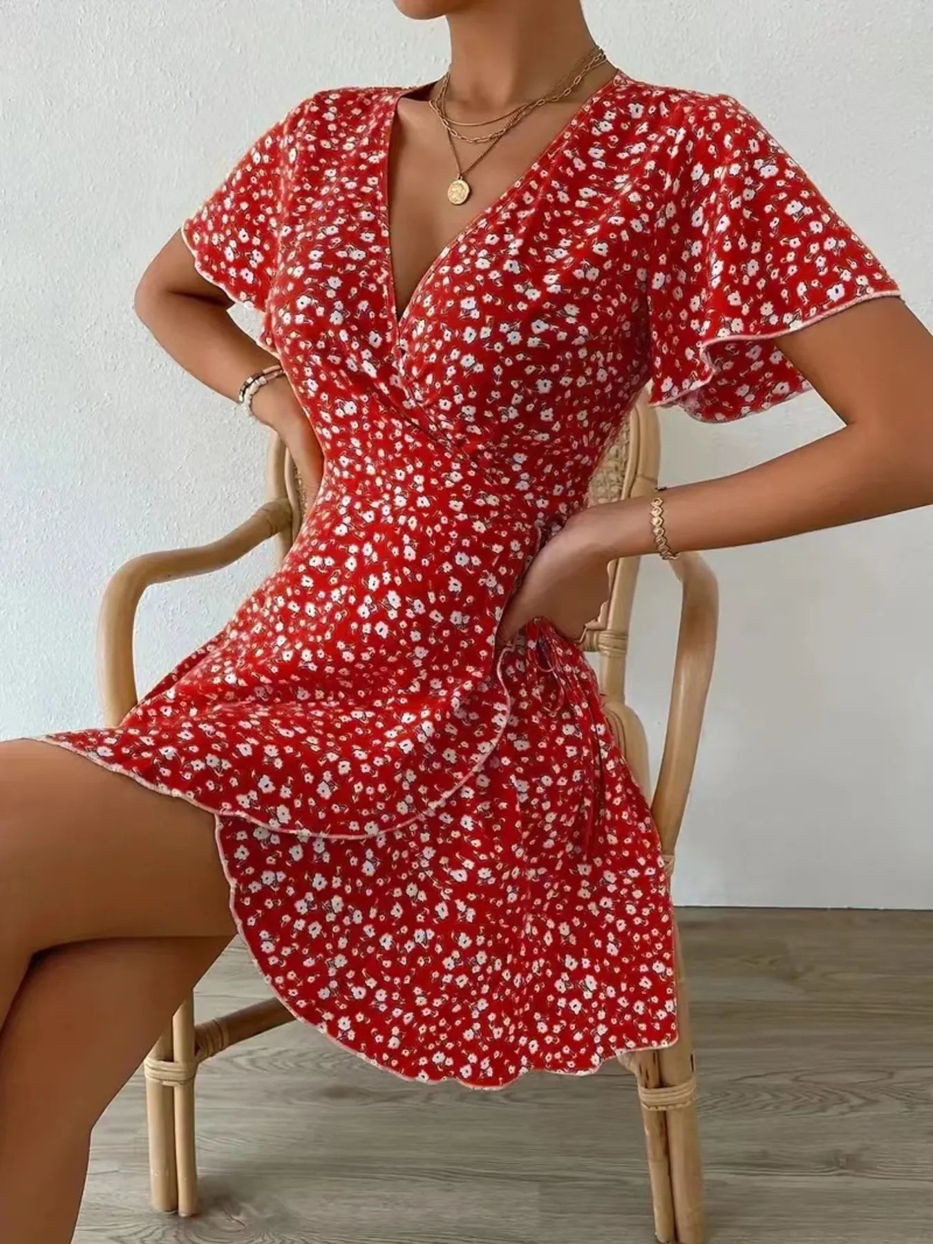 Floral Flutter Sleeve Wrap Mini Dress.