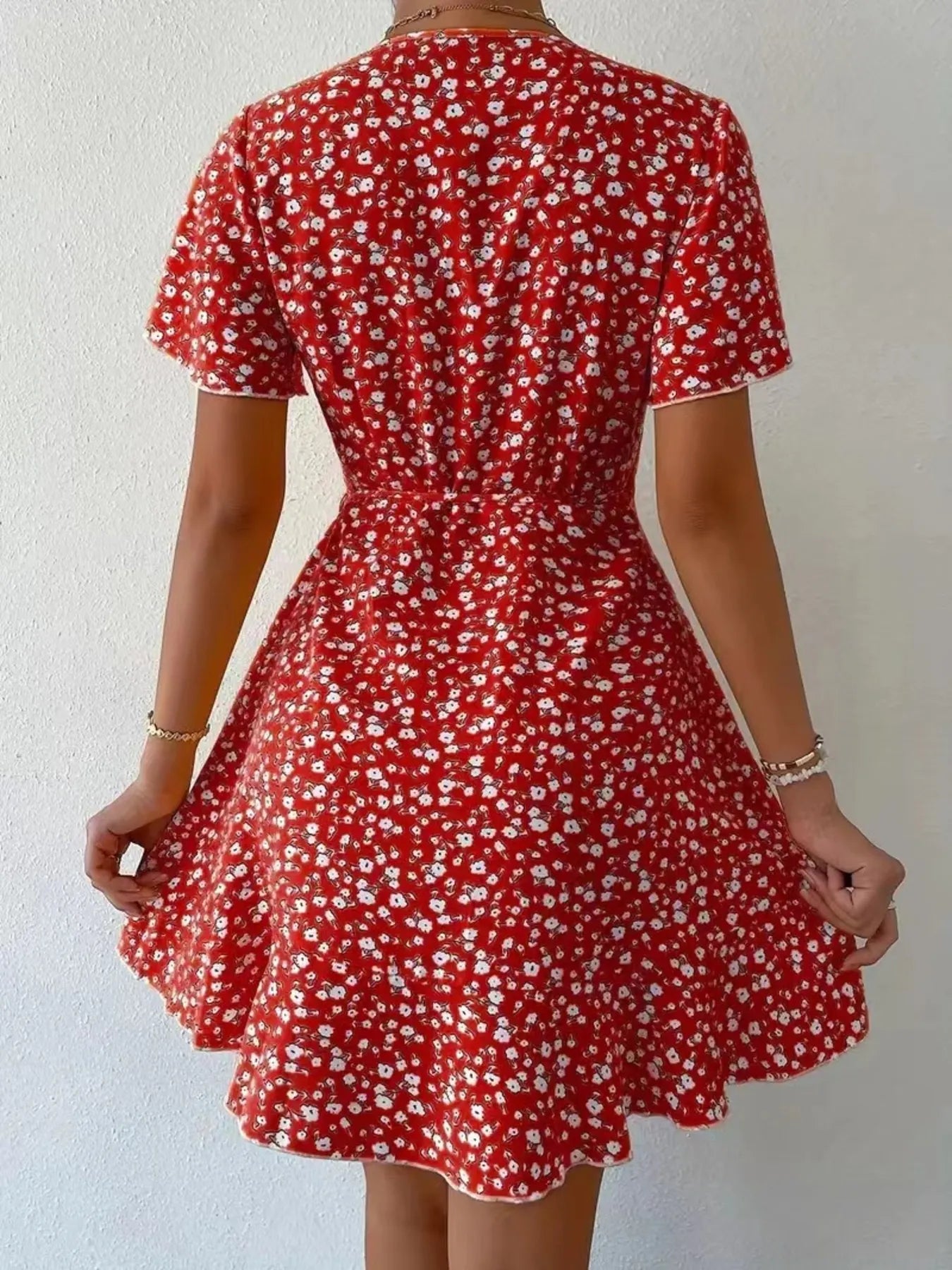 Floral Flutter Sleeve Wrap Mini Dress.