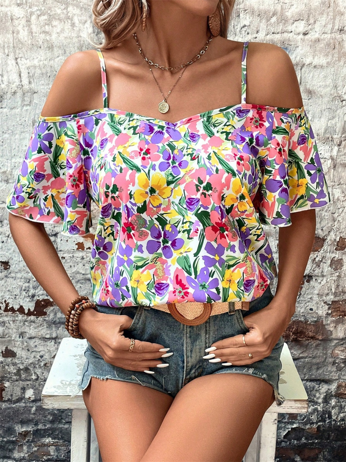 Floral half sleeve blouse.