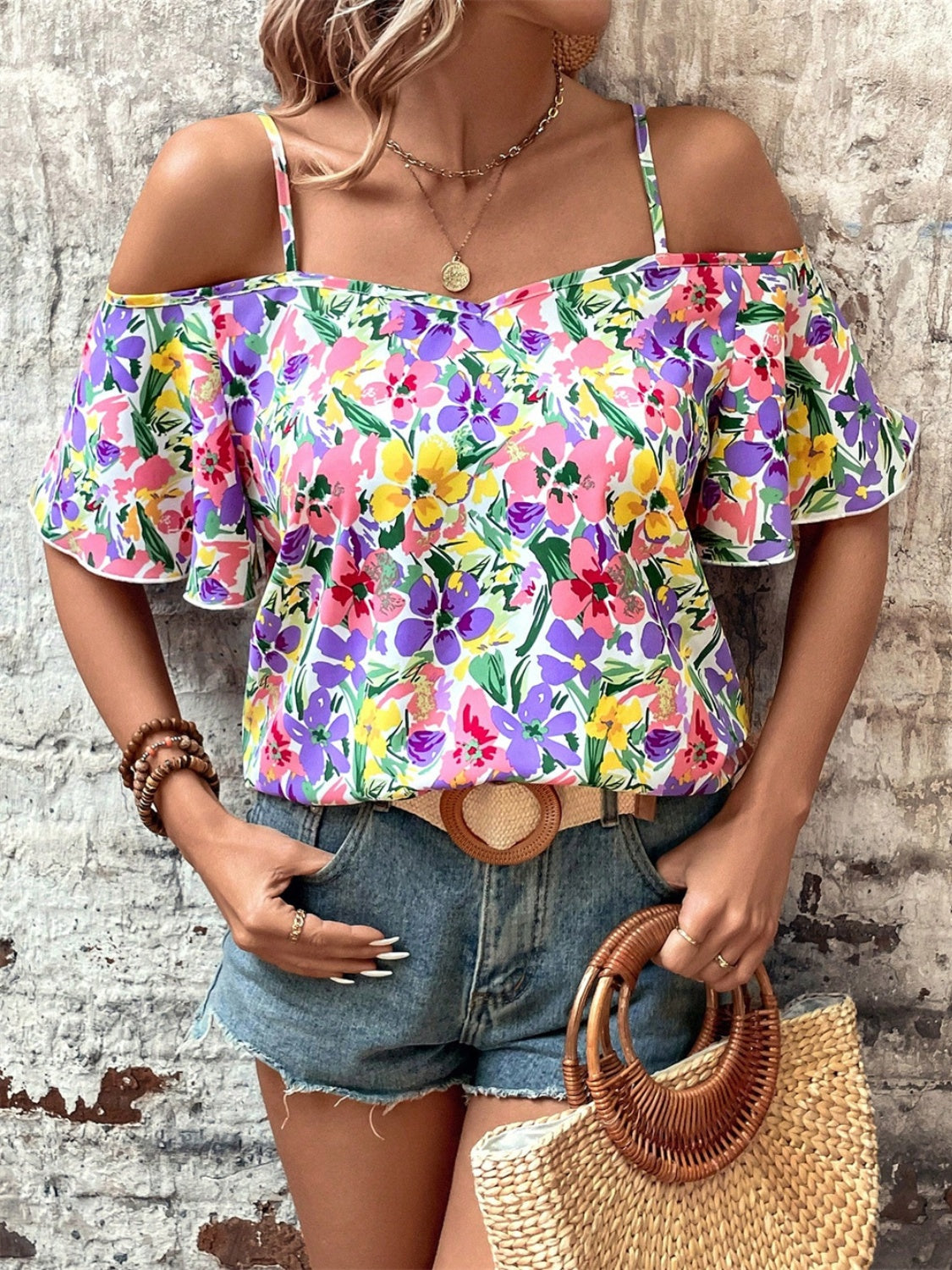 Floral half sleeve blouse.