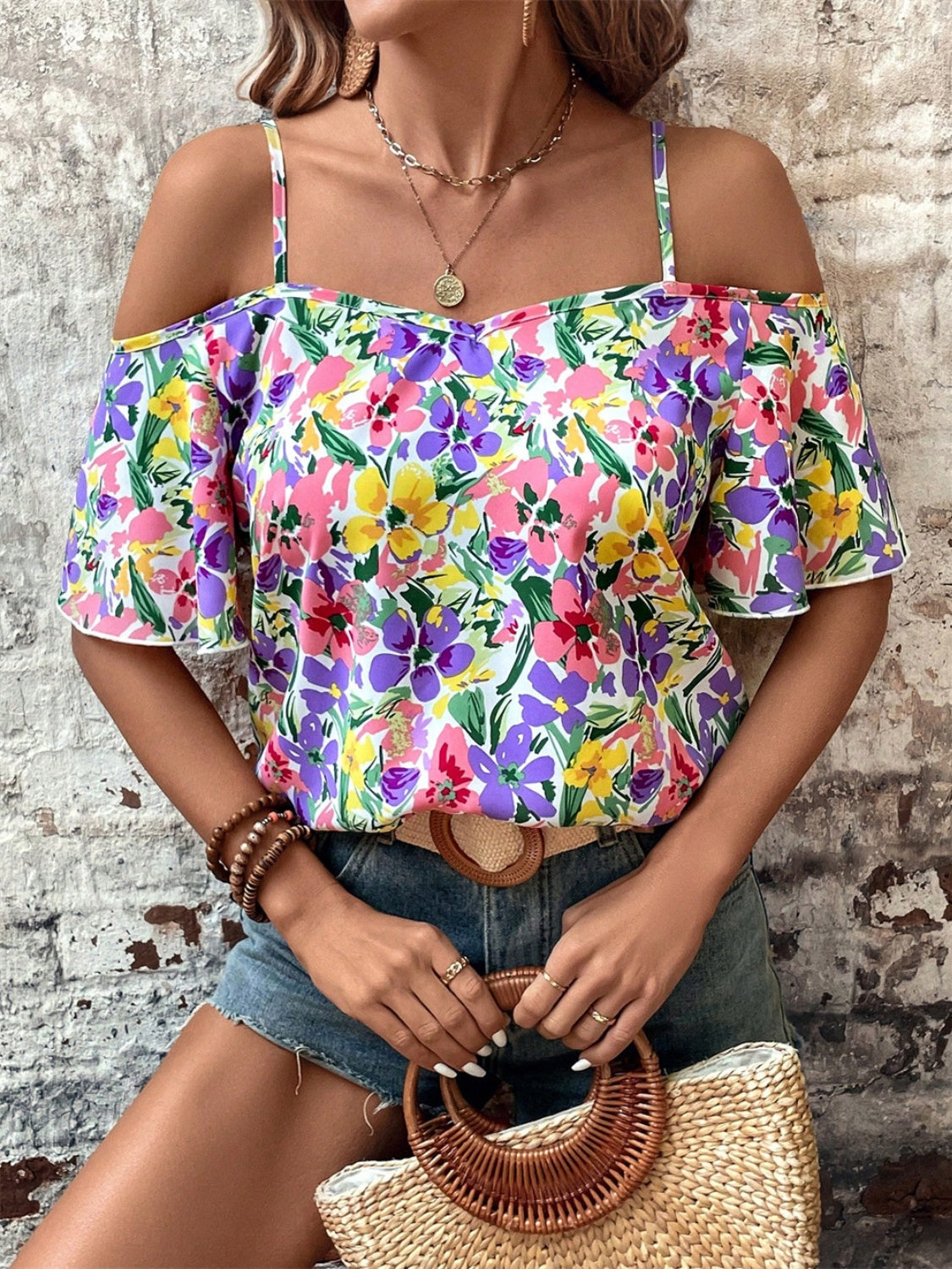 Floral half sleeve blouse.
