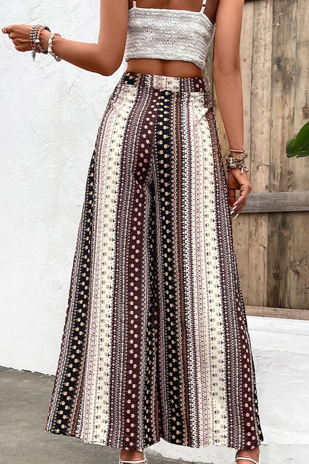 Shiny floral high waist wide leg pants, vacation casual style.