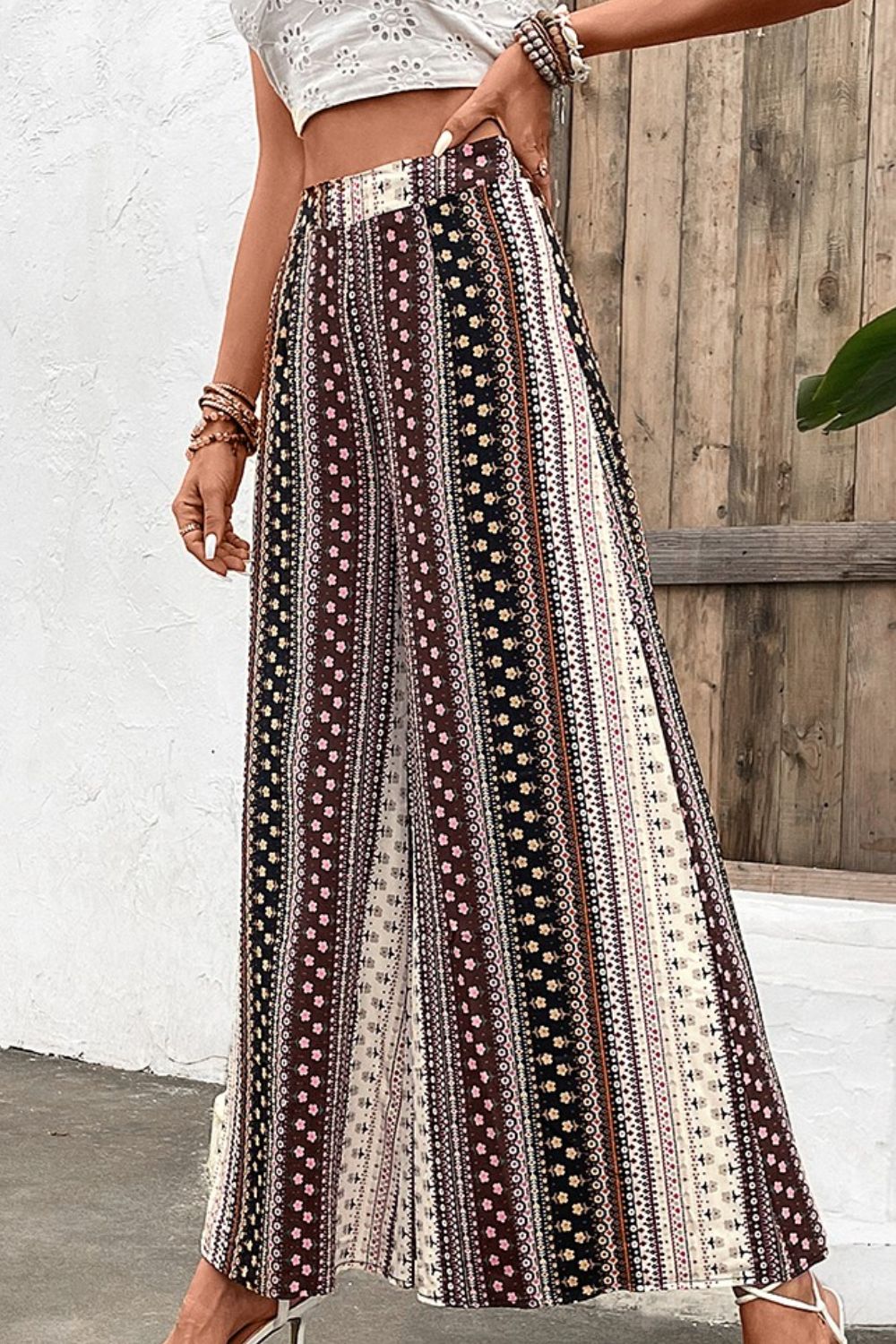 Shiny floral high waist wide leg pants, vacation casual style.