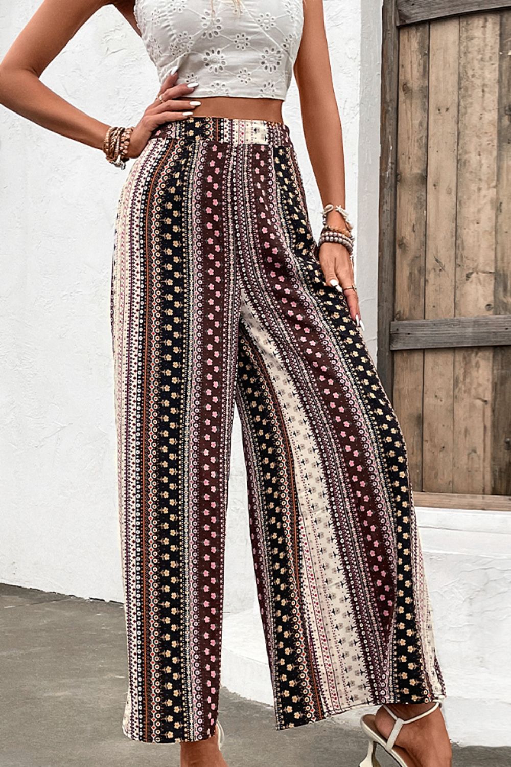 Shiny floral high waist wide leg pants, vacation casual style.