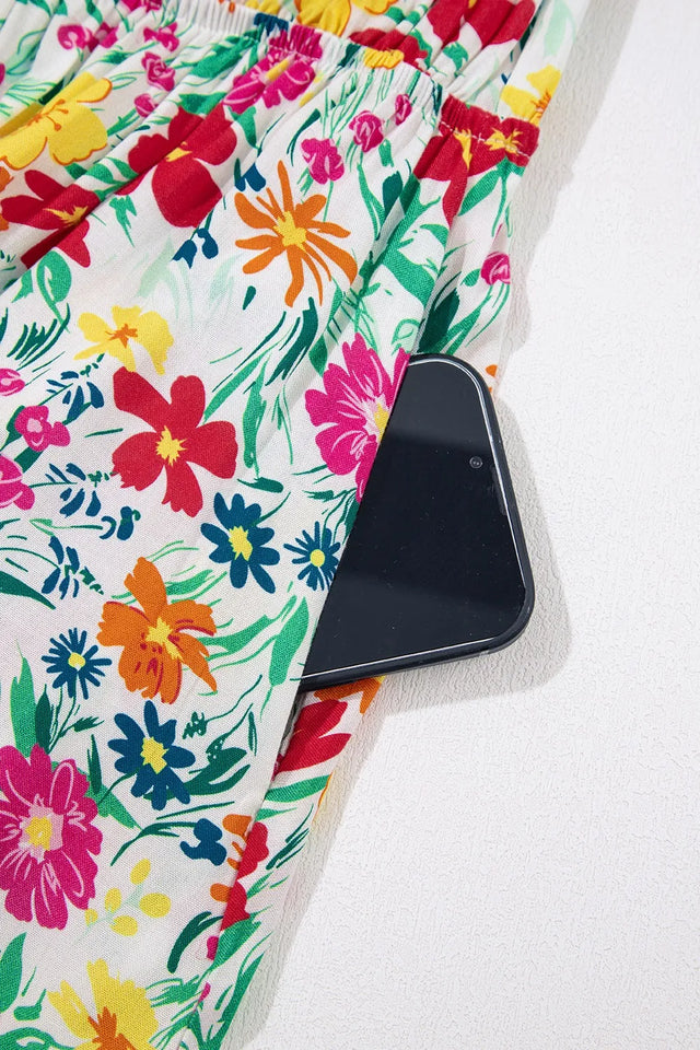 Floral Knotted Straps Cinched Waist Ruffle Hem Mini Dress.