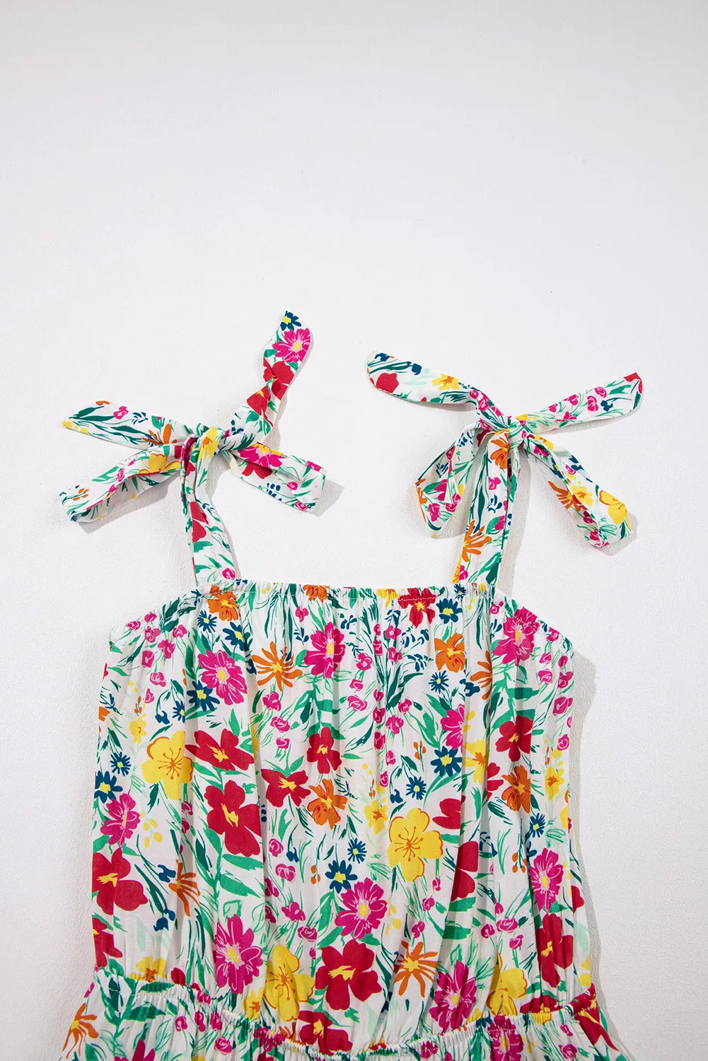 Floral Knotted Straps Cinched Waist Ruffle Hem Mini Dress.