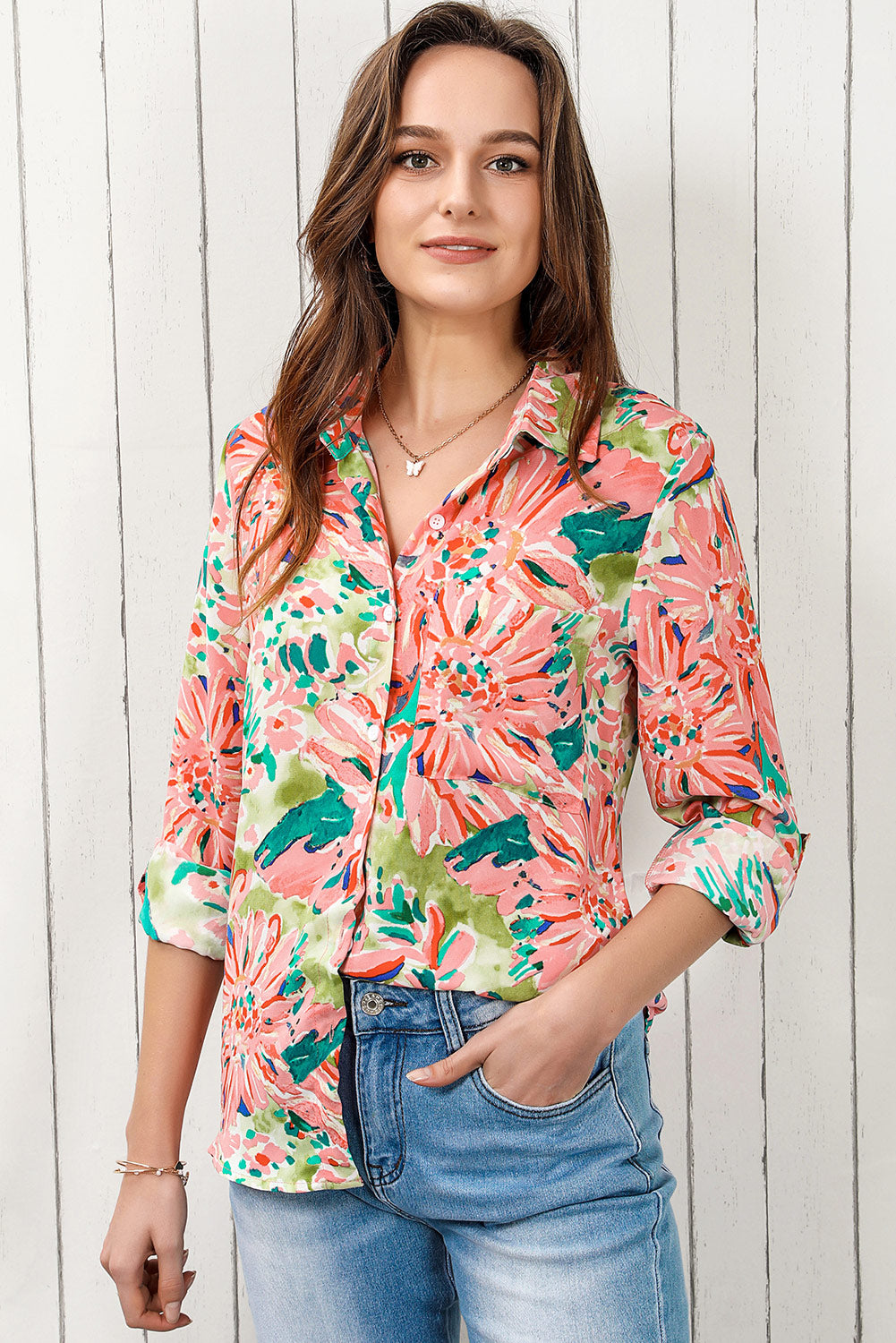 Floral long sleeve collared shirt.