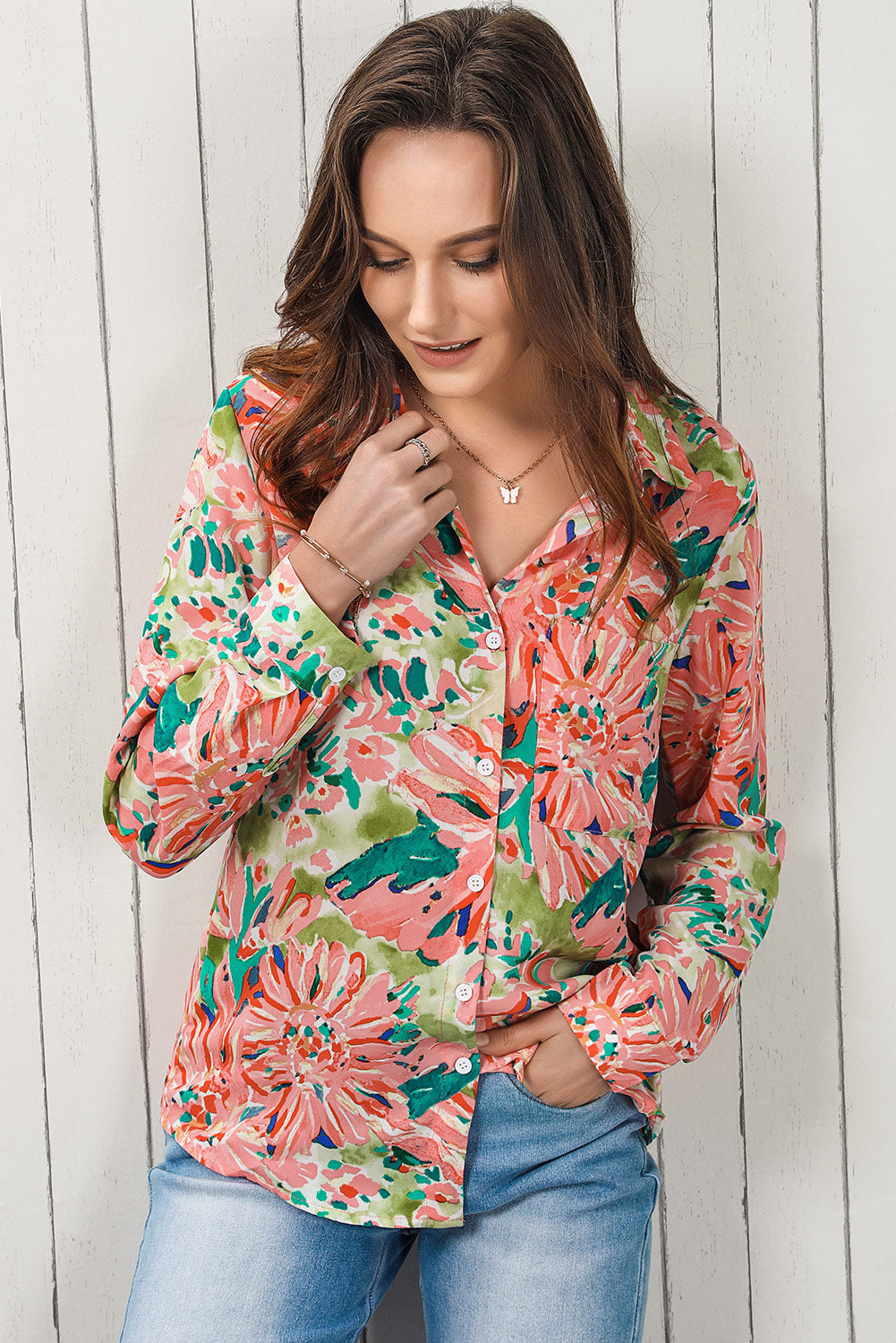 Floral long sleeve collared shirt.
