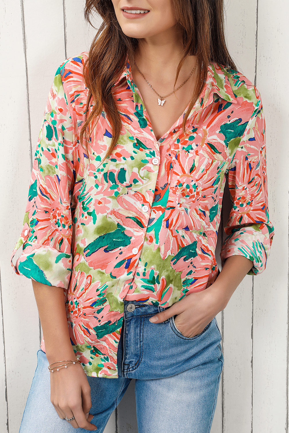 Floral long sleeve collared shirt.