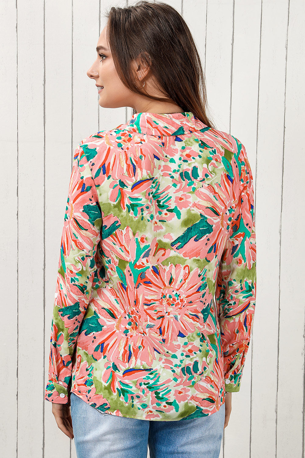 Floral long sleeve collared shirt.