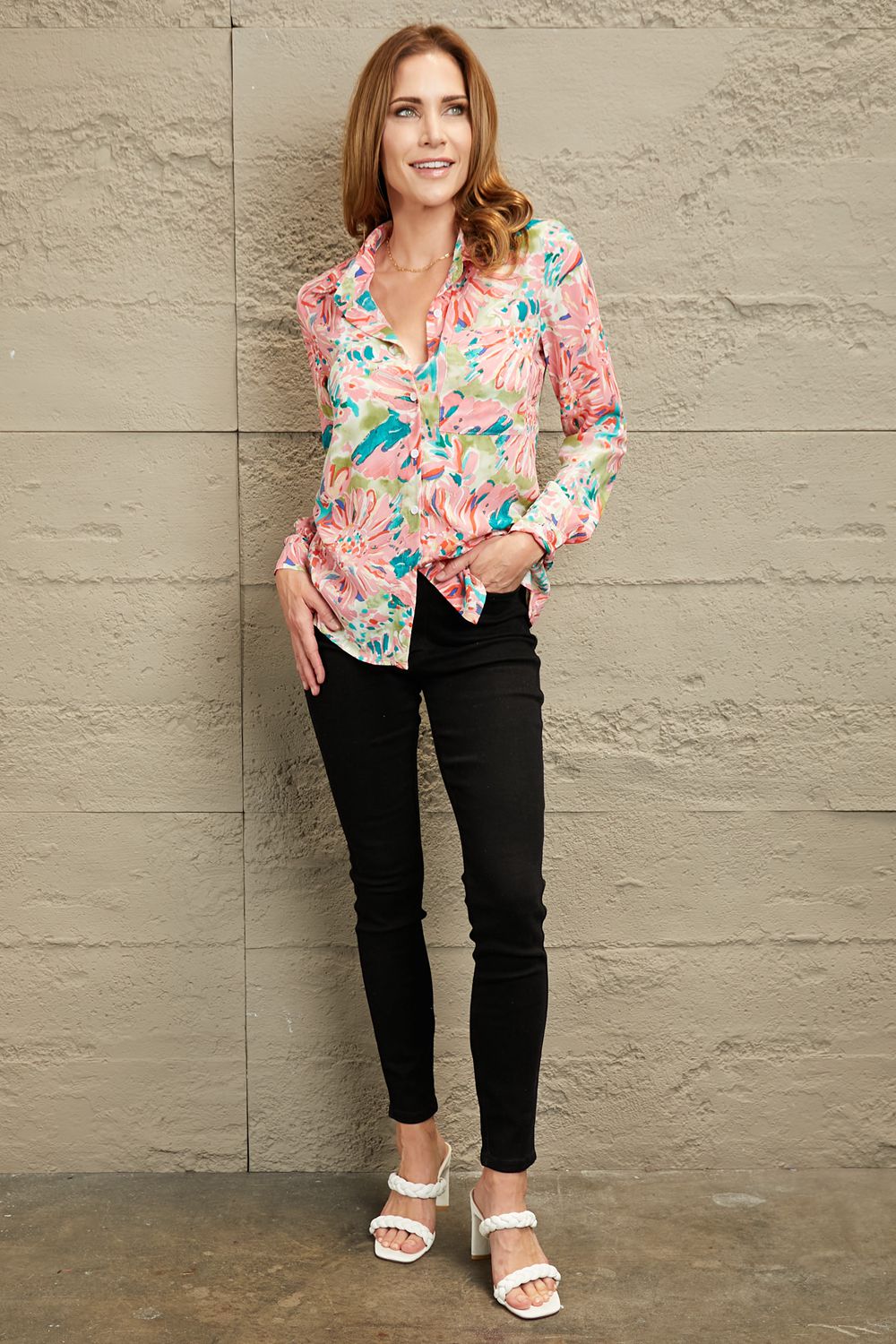 Floral long sleeve collared shirt.