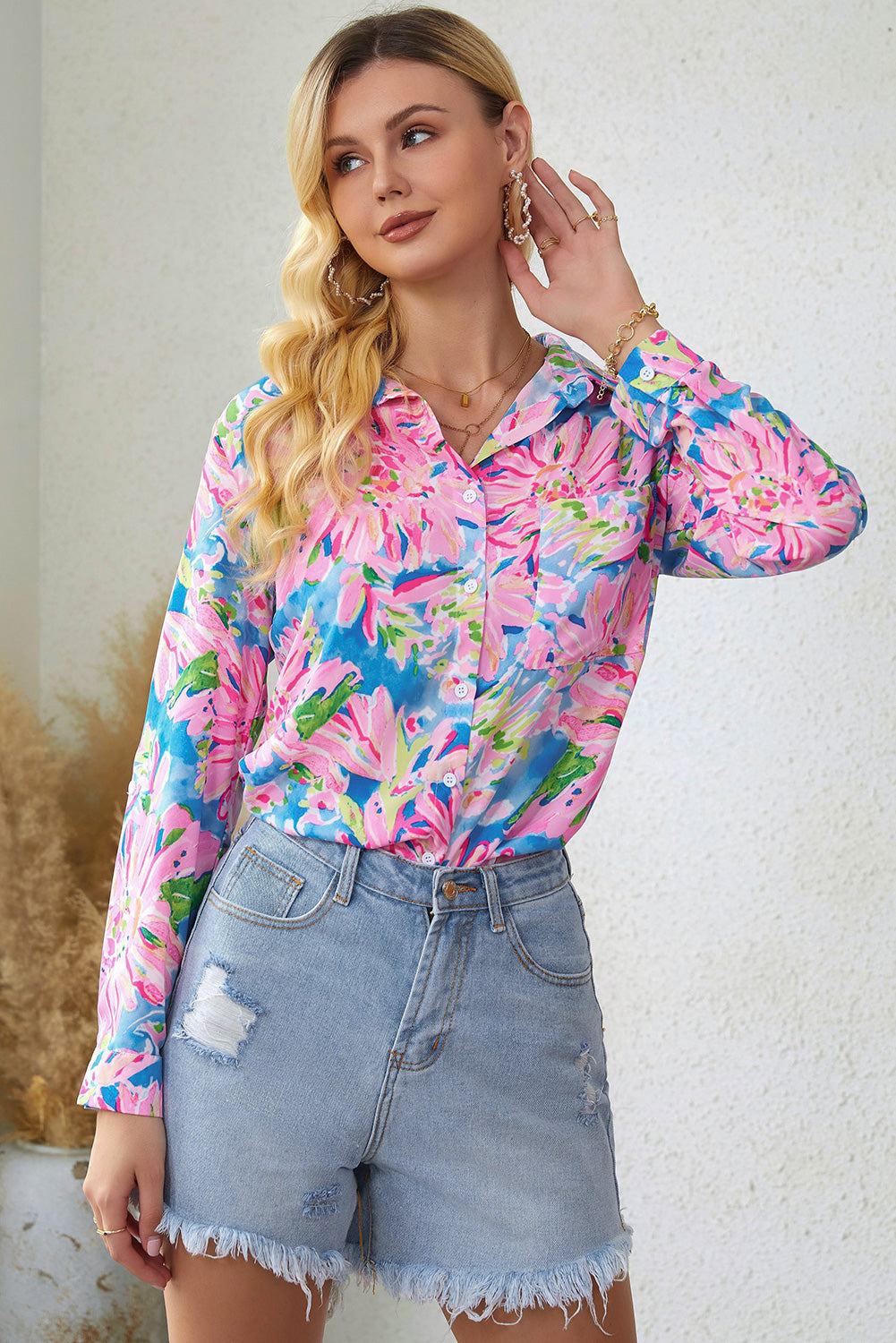 Floral long sleeve collared shirt.