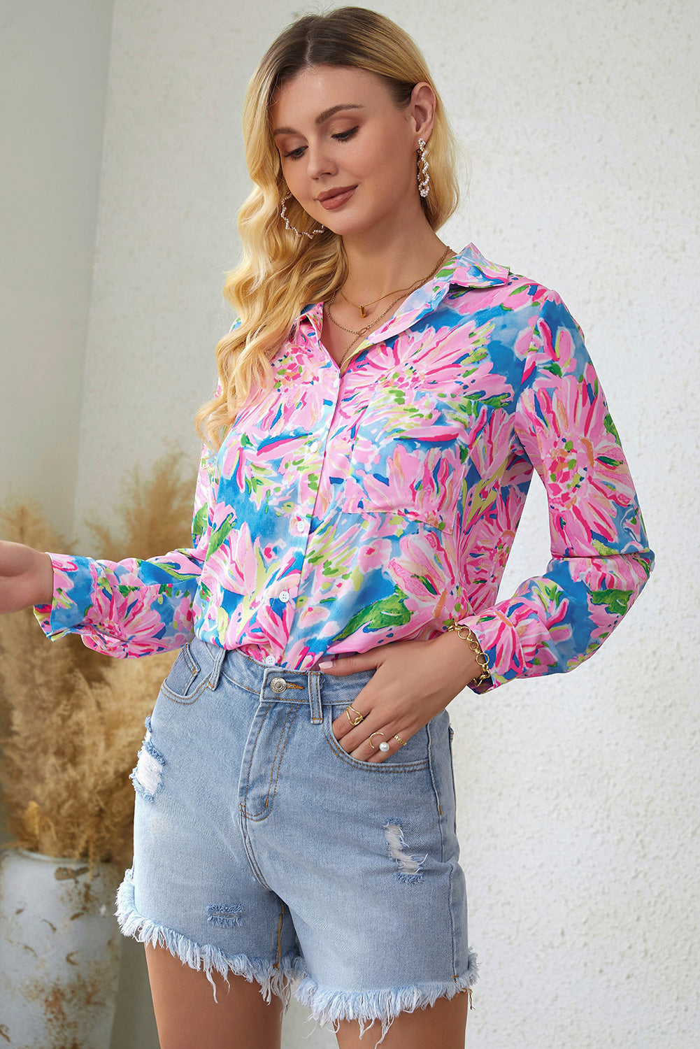 Floral long sleeve collared shirt.