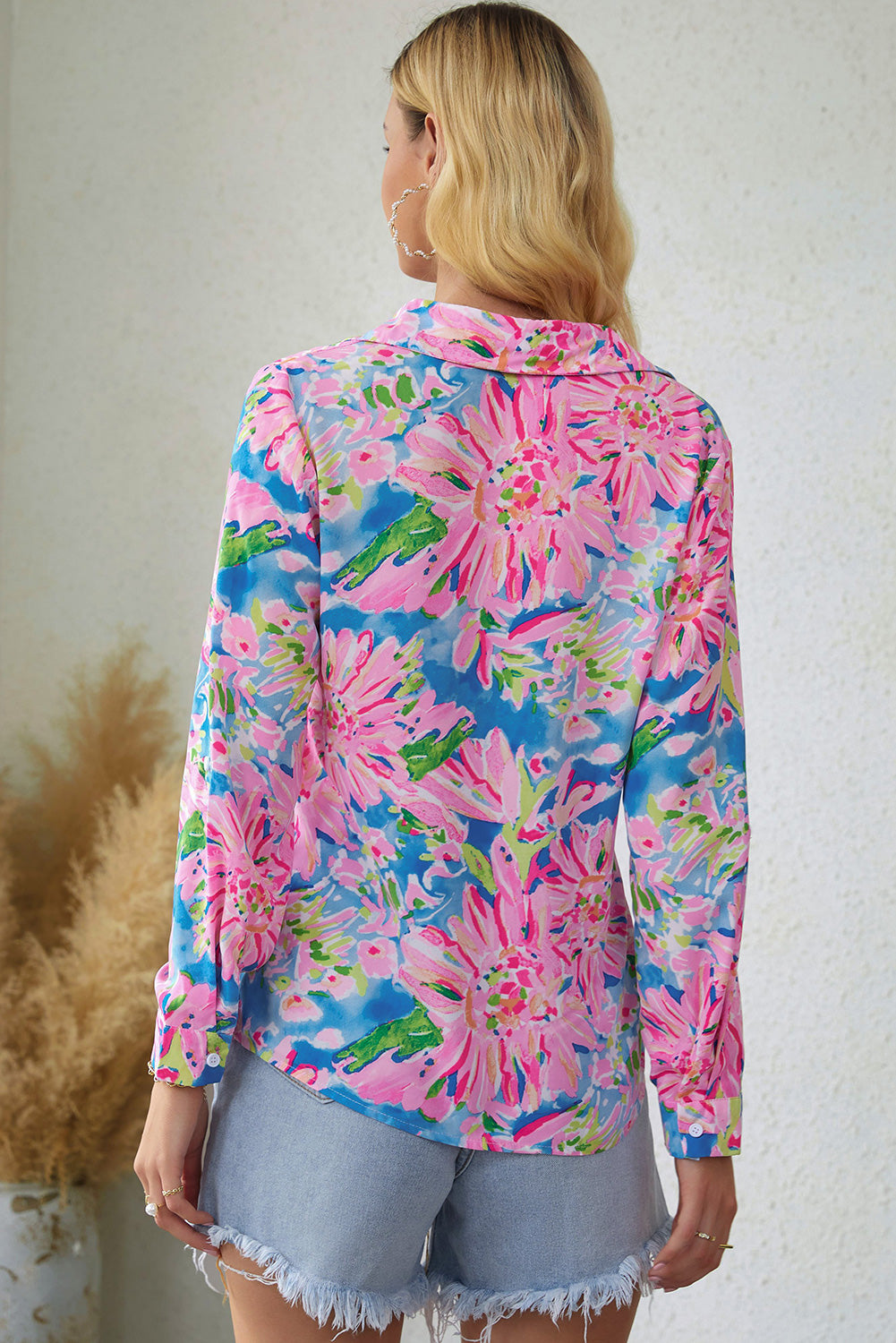 Floral long sleeve collared shirt.