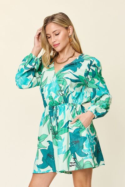 Floral Long Sleeve Romper with Pockets.