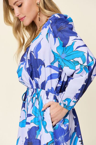 Floral Long Sleeve Romper with Pockets.