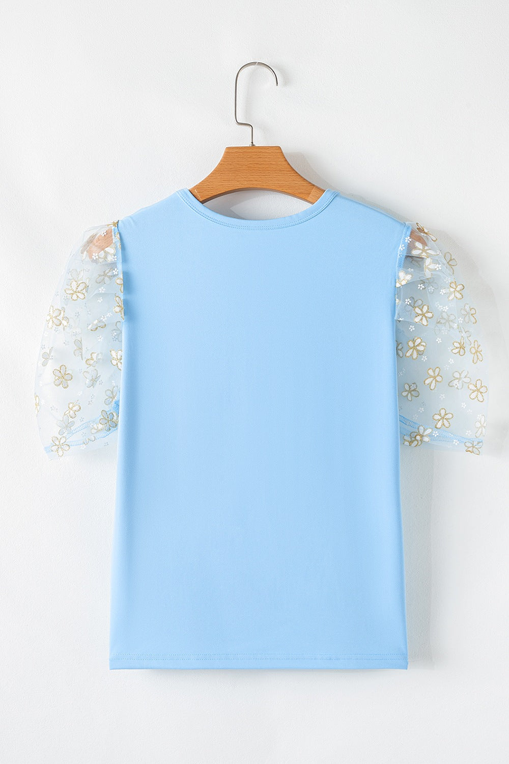 Floral mesh puff sleeve round neck top.
