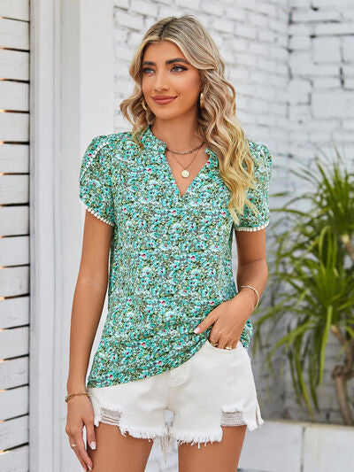 Mandy floral notched neck blouse.
