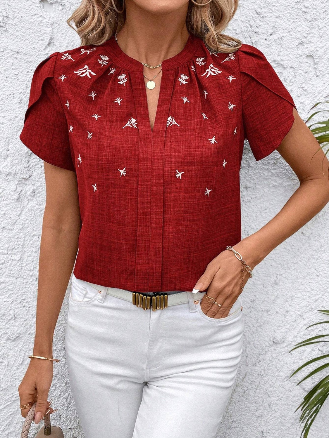 Floral notched short sleeve blouse.