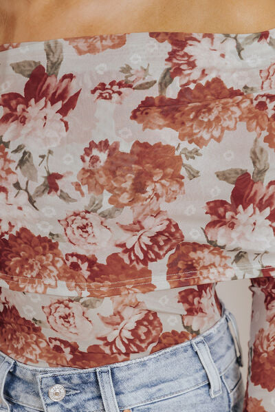 Floral off-shoulder long sleeve bodysuit.