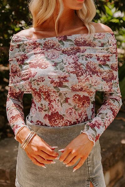 Floral off-shoulder long sleeve bodysuit.