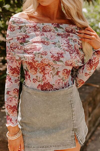 Floral off-shoulder long sleeve bodysuit.