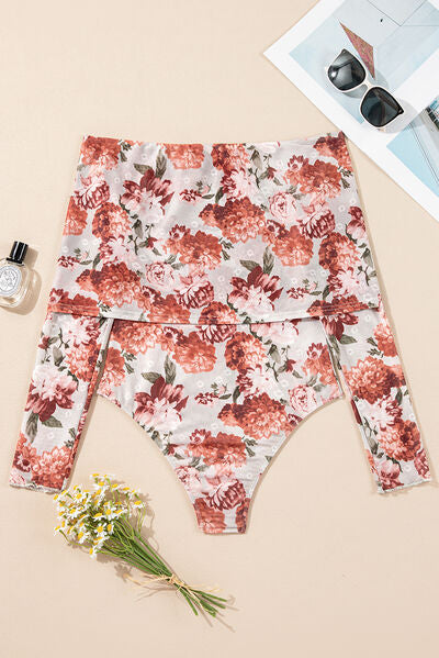 Floral off-shoulder long sleeve bodysuit.