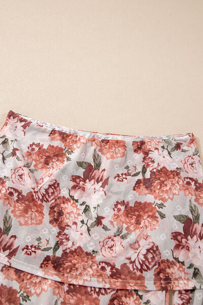 Floral off-shoulder long sleeve bodysuit.