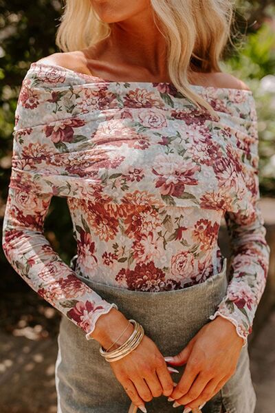 Floral off-shoulder long sleeve bodysuit.