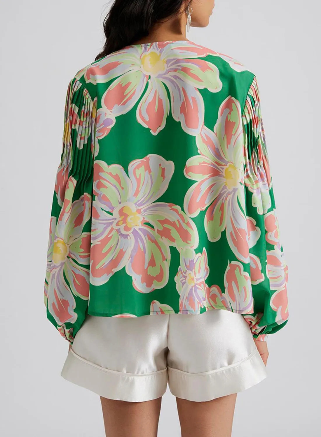 Floral pleated puff sleeve shirt.