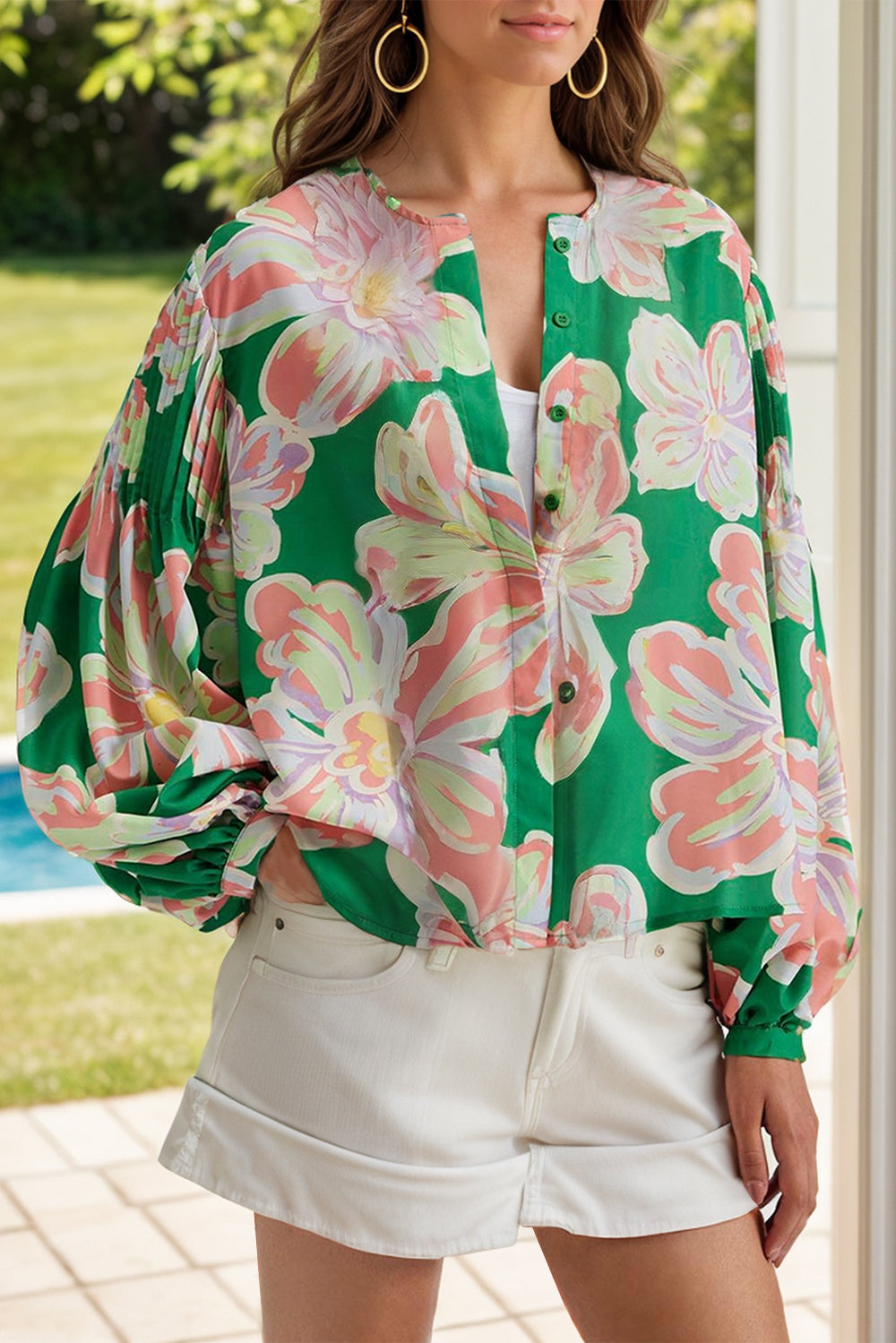Floral pleated puff sleeve shirt.