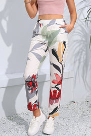 Floral print cropped pants with pockets, chic style.