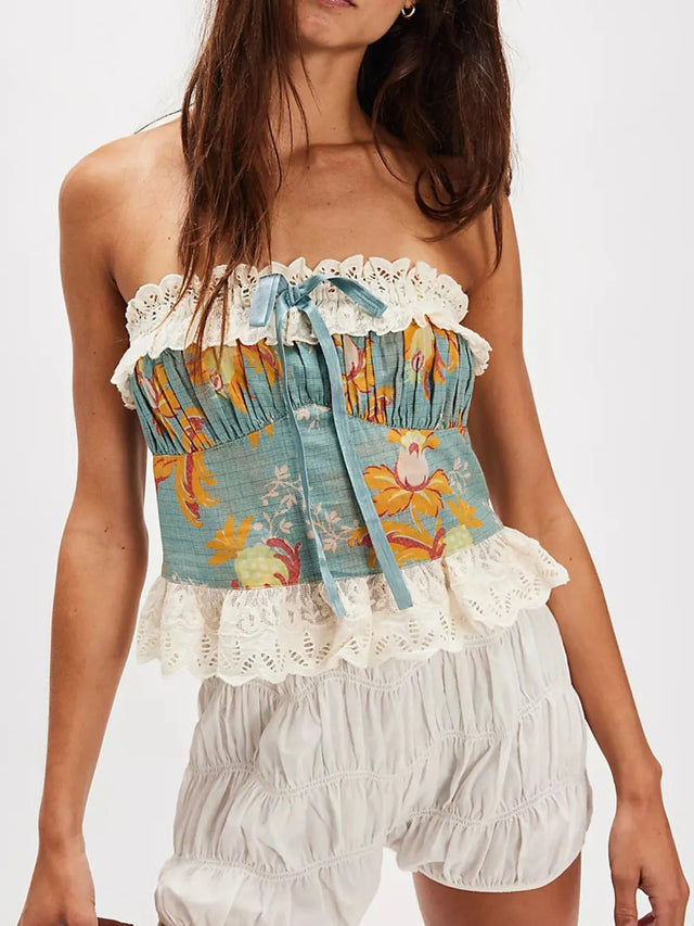 Floral print tube top with lace trim and bow.