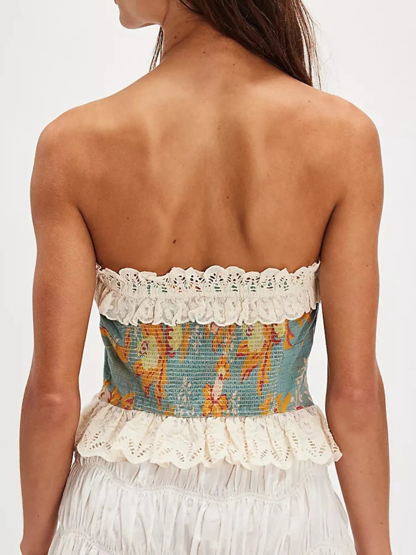 Floral print tube top with lace trim and bow.