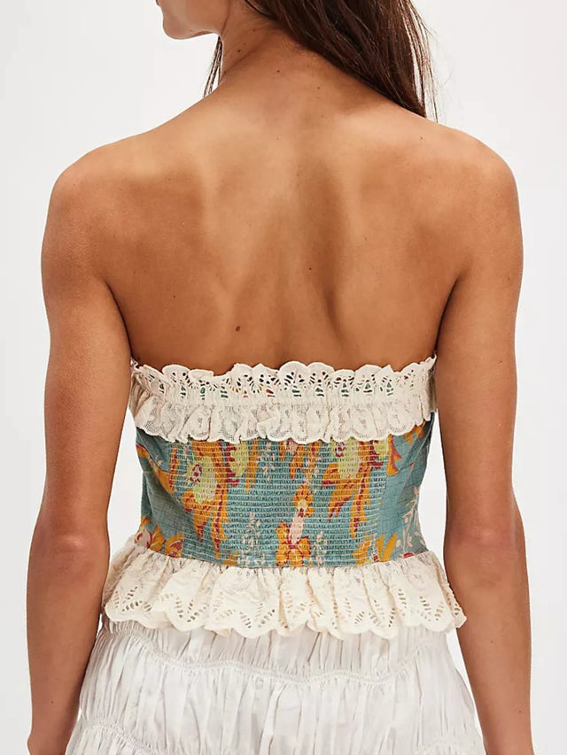 Floral print tube top with lace trim and bow.