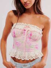 Floral print tube top with lace trim and bow.