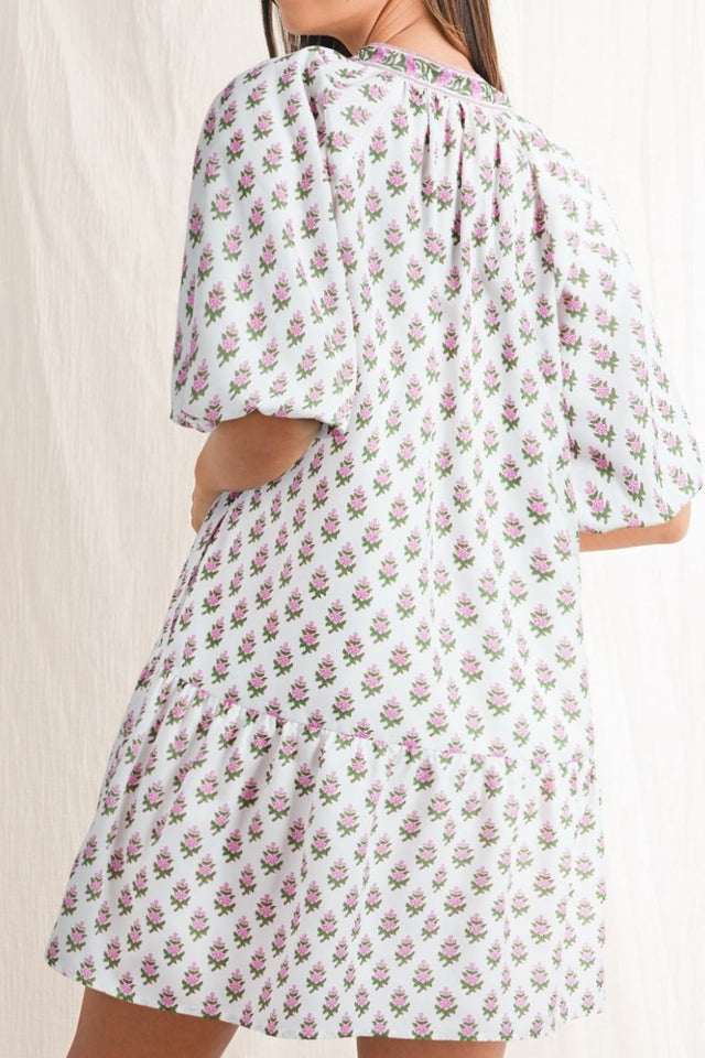 Floral Print Puff Sleeve Tie Neck Ruffled Hem Dress.