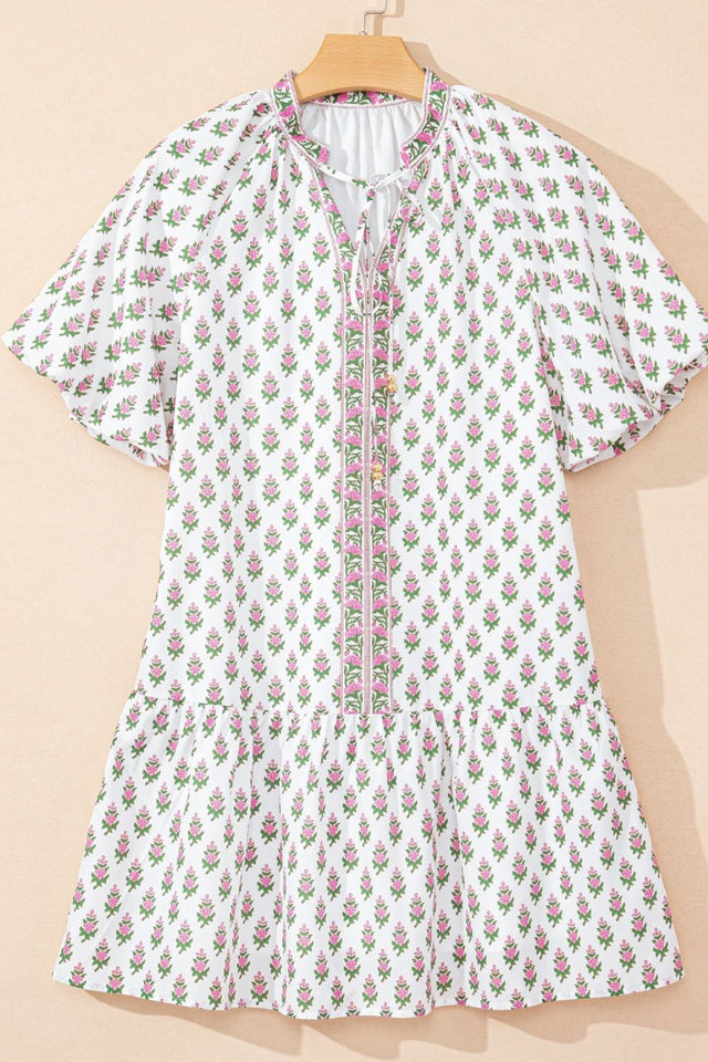 Floral Print Puff Sleeve Tie Neck Ruffled Hem Dress.