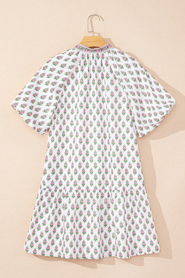 Floral Print Puff Sleeve Tie Neck Ruffled Hem Dress.