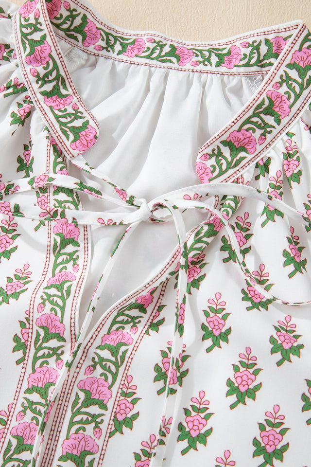 Floral Print Puff Sleeve Tie Neck Ruffled Hem Dress.