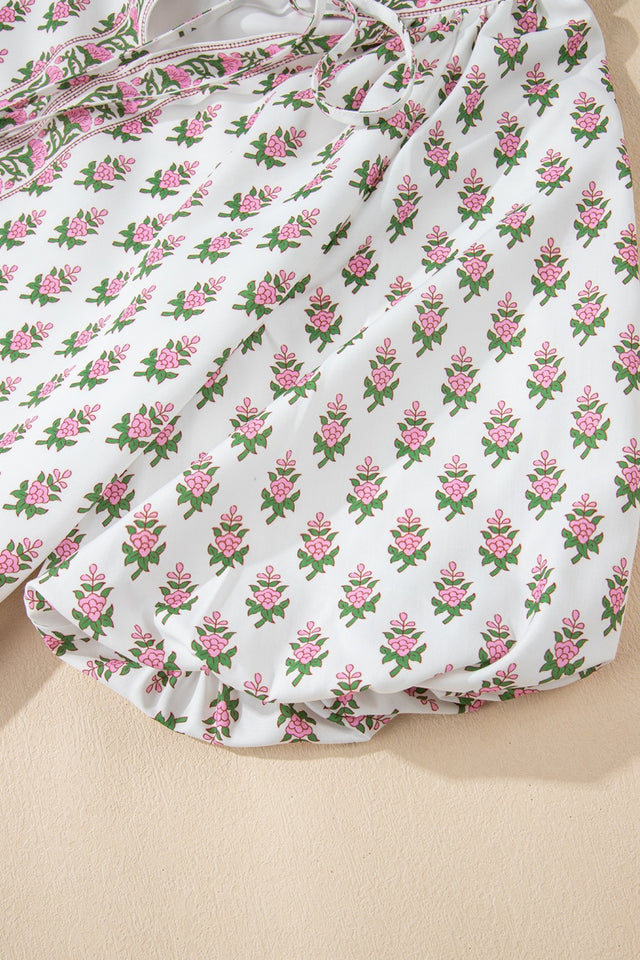 Floral Print Puff Sleeve Tie Neck Ruffled Hem Dress.