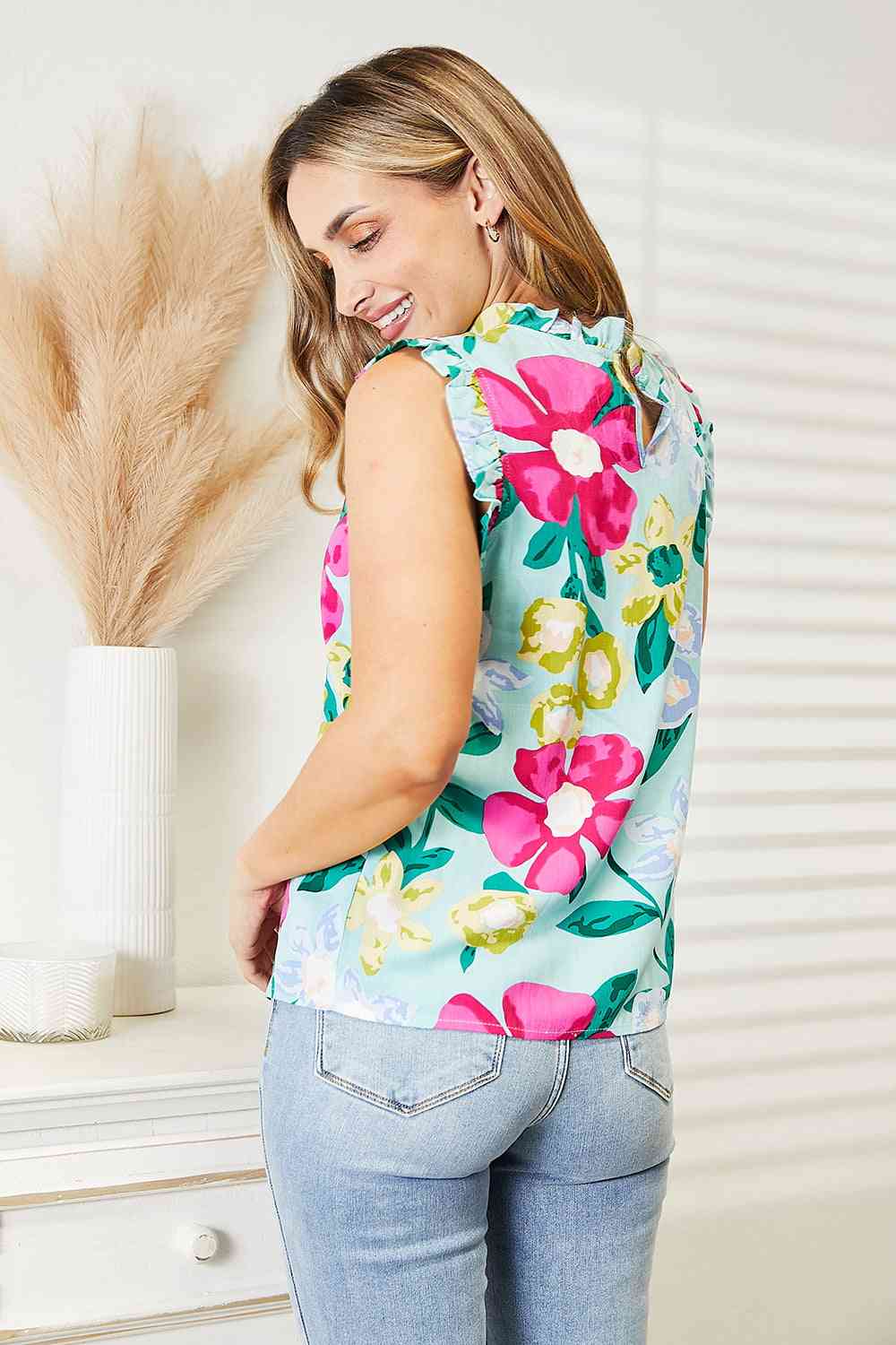 Double Take floral print ruffle shoulder blouse.