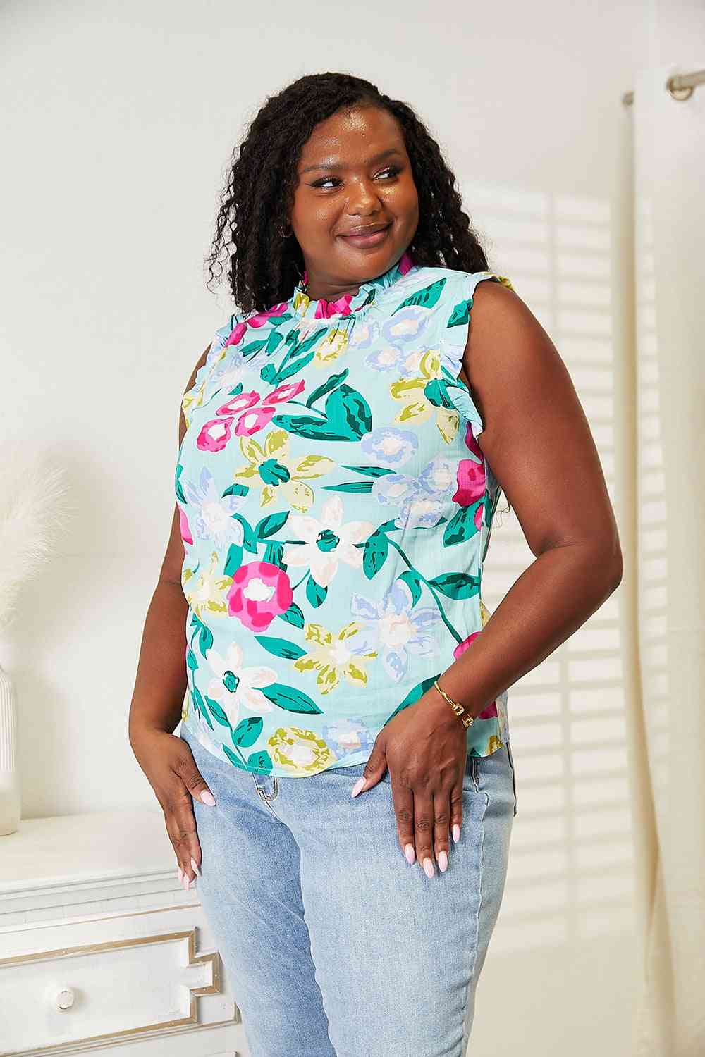 Double Take floral print ruffle shoulder blouse.