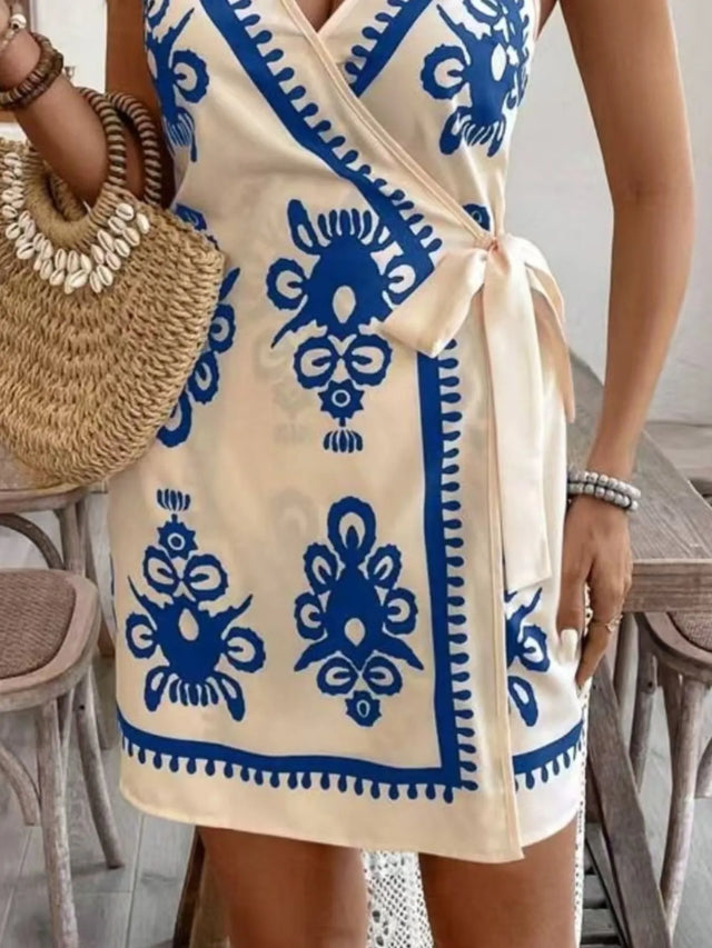 Floral Print Spaghetti Strap Wrap Mini Dress.