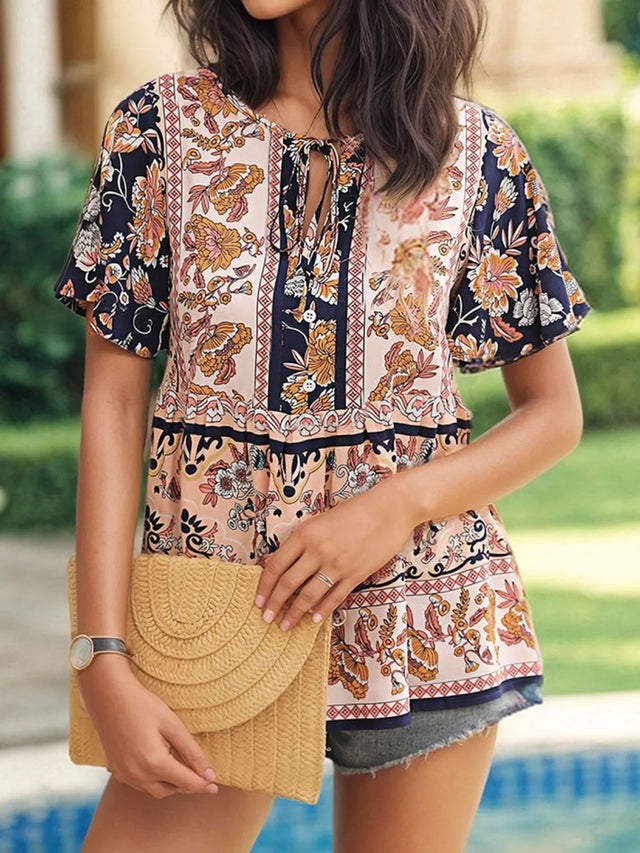 Floral Print Tie Neck Flutter Sleeve Blouse.