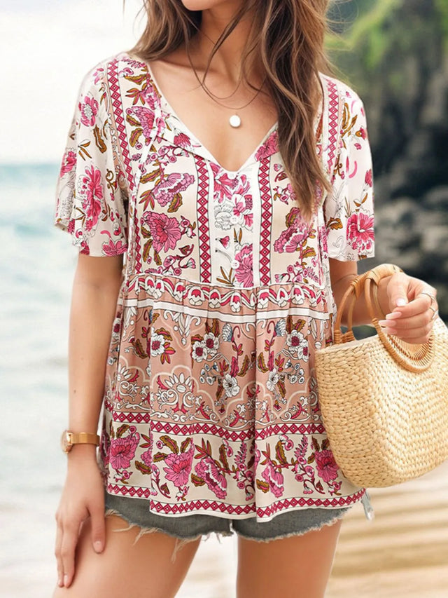 Floral Print Tie Neck Flutter Sleeve Blouse.