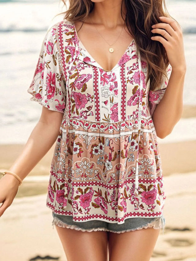 Floral Print Tie Neck Flutter Sleeve Blouse.